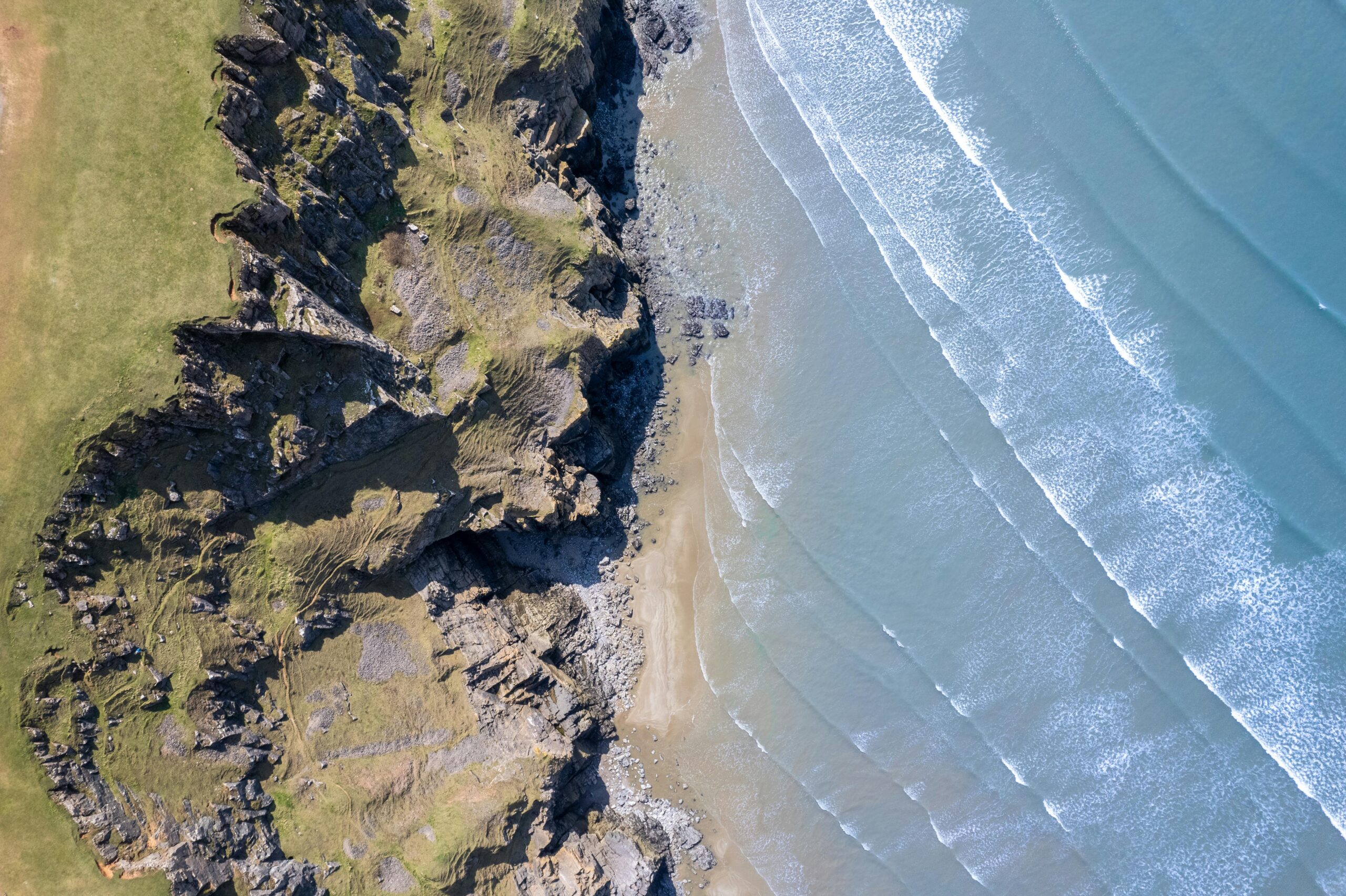 Aerial view of a sandy beach on the Gower Peninsula